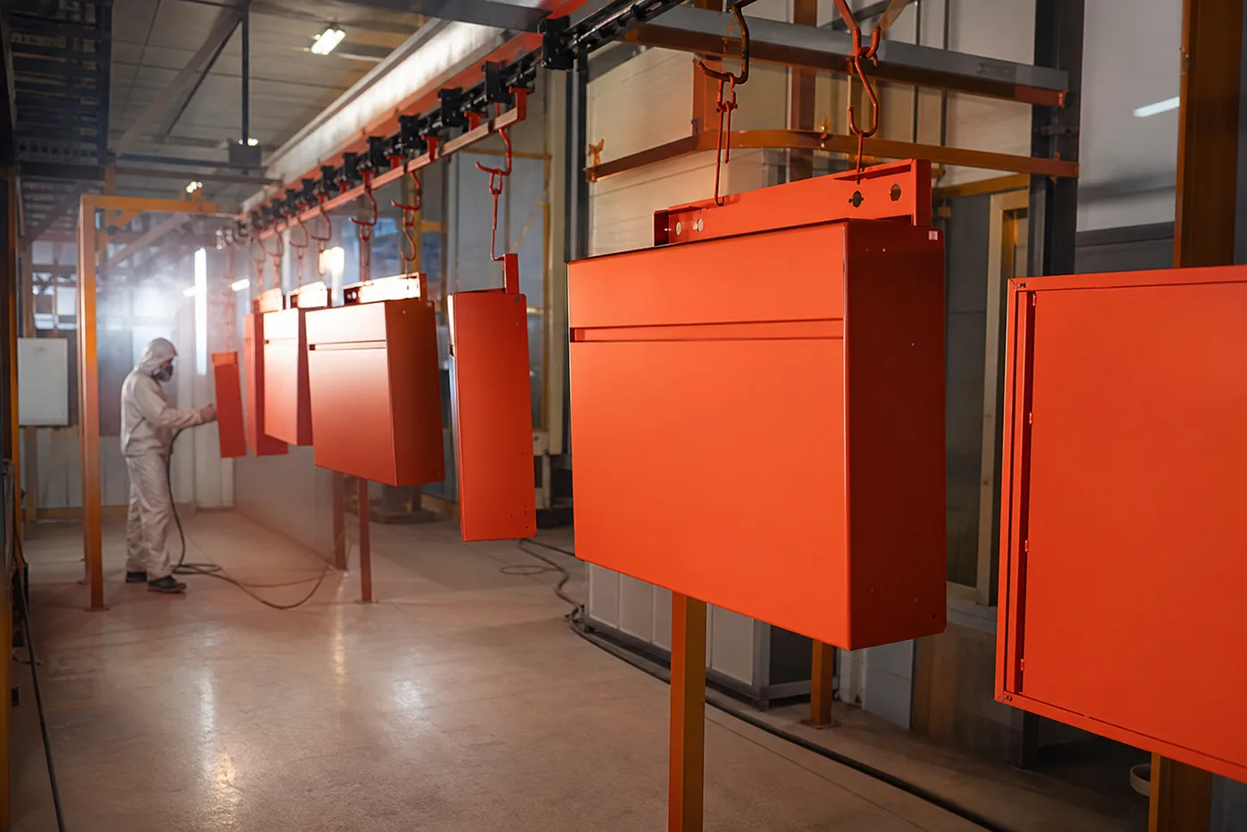 Powder coating line with checkout counter panels